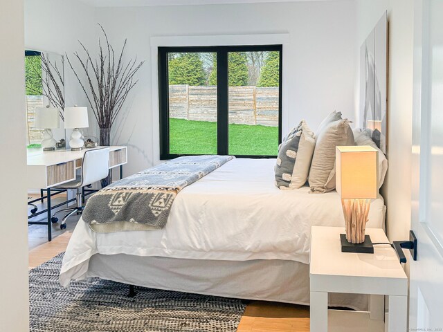 bedroom featuring wood finished floors