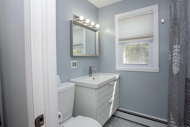 bathroom with vanity, a baseboard radiator, and toilet