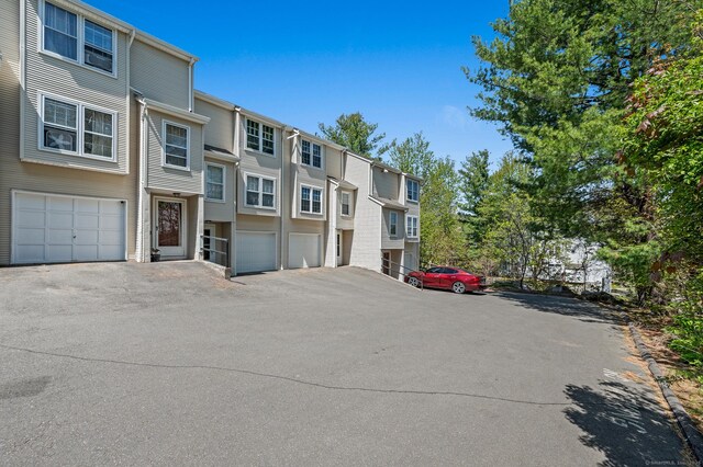 25 Deerwood Ln Unit 8, Waterbury, CT 06704 - view of road with a residential view