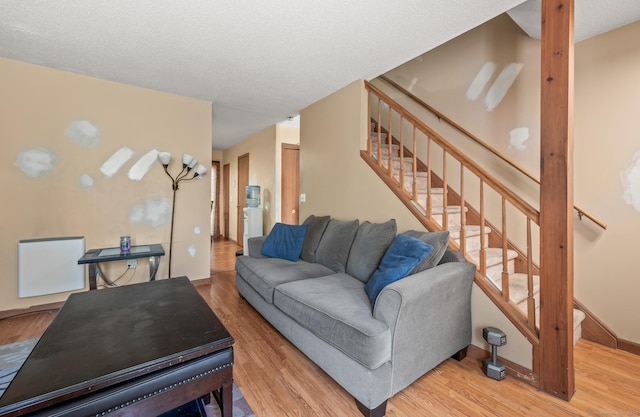 25 Deerwood Ln Unit 8, Waterbury, CT 06704 - living area with stairs and wood finished floors