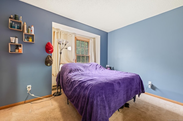 25 Deerwood Ln Unit 8, Waterbury, CT 06704 - carpeted bedroom with baseboards and a baseboard radiator