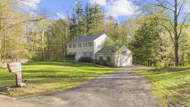 6 Old Farm Rd, Woodbridge, CT 06525 - colonial-style house with a garage, a front lawn, and aphalt driveway