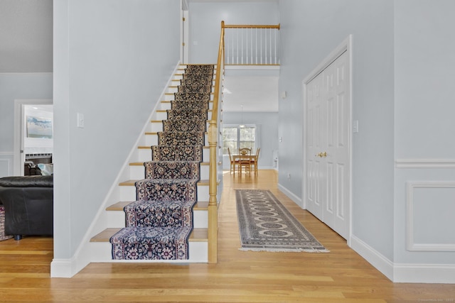 6 Old Farm Rd, Woodbridge, CT 06525 - stairs with baseboards, a high ceiling, and wood finished floors