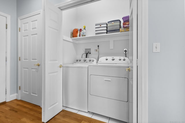 6 Old Farm Rd, Woodbridge, CT 06525 - laundry room featuring laundry area, washer and clothes dryer, and light wood-type flooring