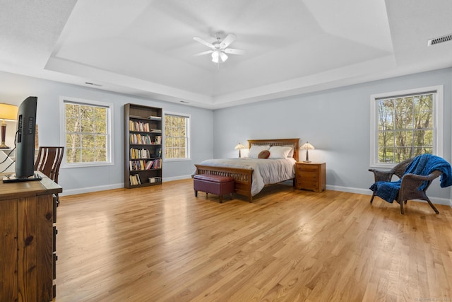 6 Old Farm Rd, Woodbridge, CT 06525 - bedroom featuring a tray ceiling, visible vents, baseboards, and light wood-type flooring
