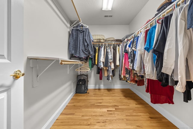 6 Old Farm Rd, Woodbridge, CT 06525 - spacious closet featuring visible vents and wood finished floors