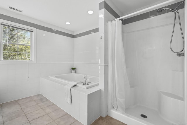 6 Old Farm Rd, Woodbridge, CT 06525 - full bathroom with a bath, visible vents, tile walls, a shower stall, and tile patterned floors
