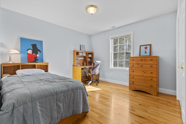 6 Old Farm Rd, Woodbridge, CT 06525 - bedroom with baseboards, visible vents, and light wood-type flooring