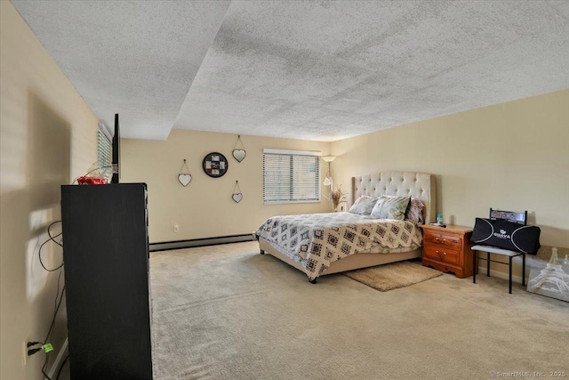 bedroom featuring carpet flooring, a textured ceiling, and a baseboard radiator