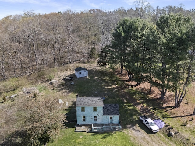 aerial view featuring a view of trees