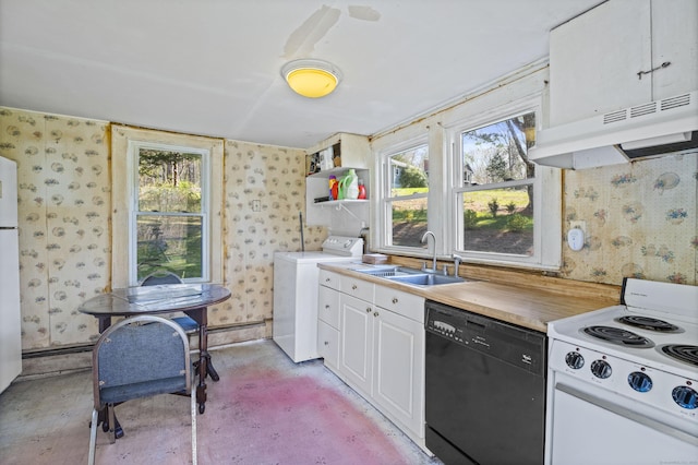 kitchen with a sink, washer / clothes dryer, white appliances, and wallpapered walls