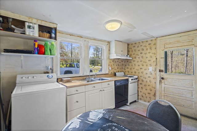 kitchen featuring range, dishwasher, light countertops, washer / dryer, and under cabinet range hood