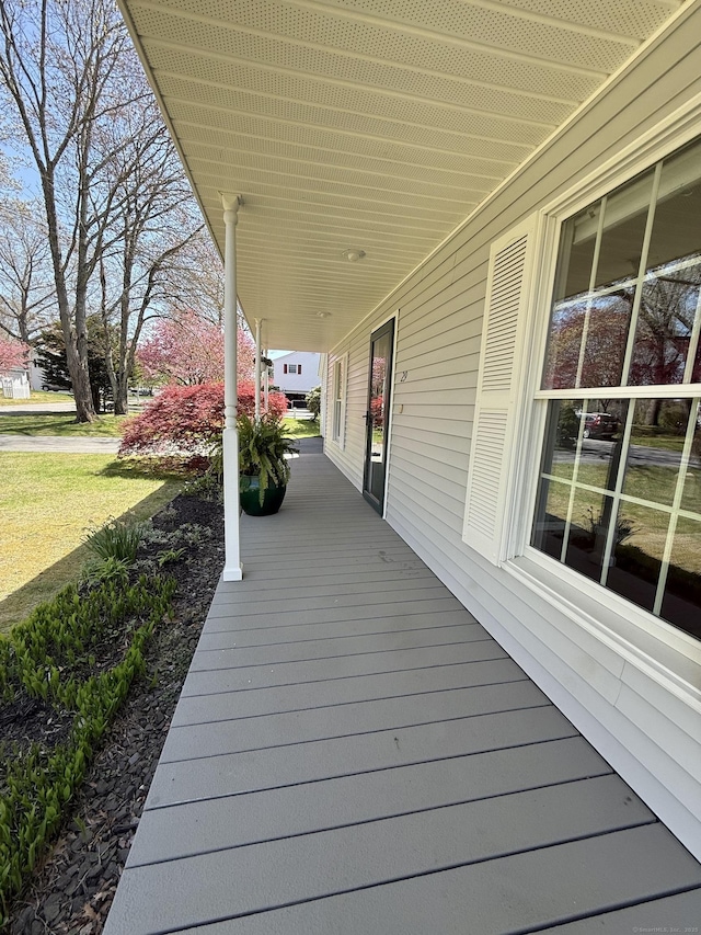wooden terrace with covered porch