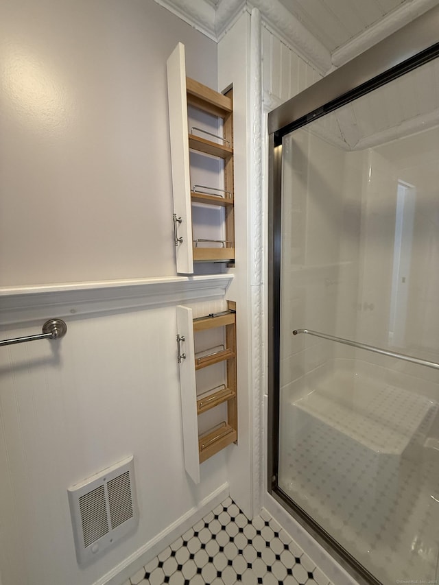 bathroom featuring visible vents and a stall shower