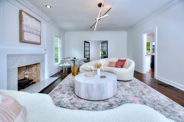 9 November Trl, Weston, CT 06883 - living area with ornamental molding, baseboards, a premium fireplace, dark wood-style floors, and recessed lighting