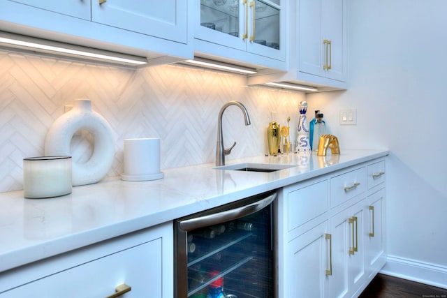 9 November Trl, Weston, CT 06883 - bar with wine cooler, a sink, backsplash, and baseboards