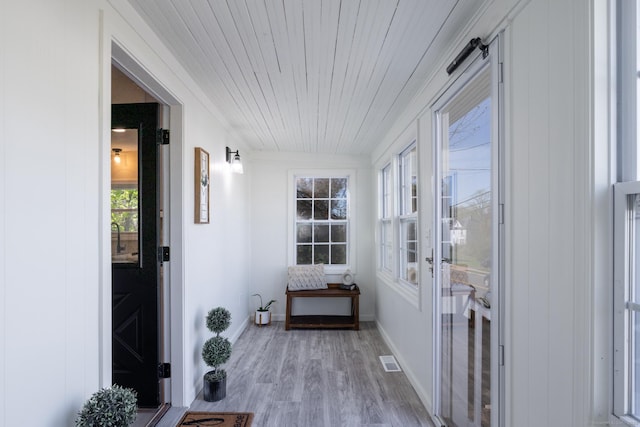 sunroom / solarium featuring visible vents