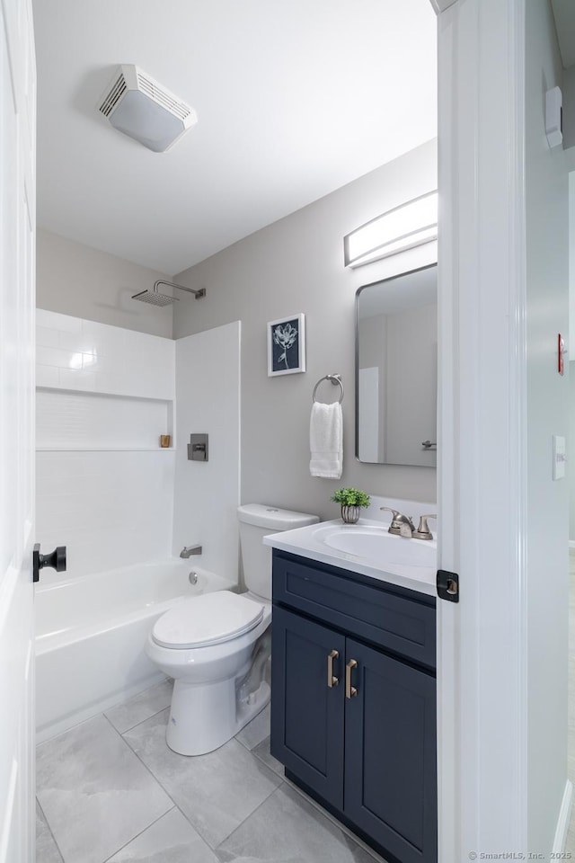 bathroom with visible vents, vanity, toilet, marble finish floor, and tub / shower combination