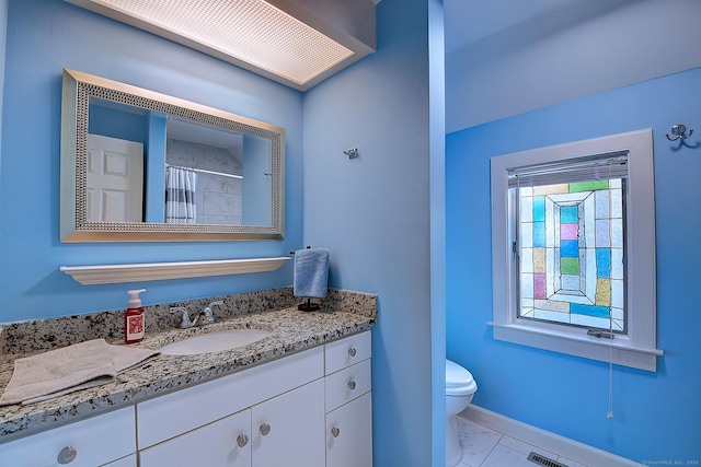 189 Red Stone Hl Unit 17, Bristol, CT 06010 - bathroom with vanity, curtained shower, toilet, baseboards, and tile patterned floors