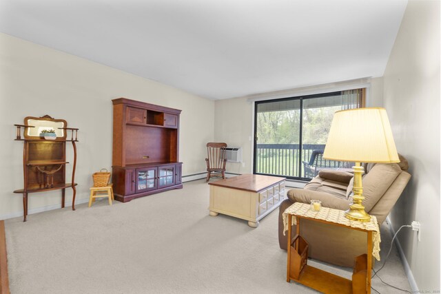 living room featuring baseboards and light carpet
