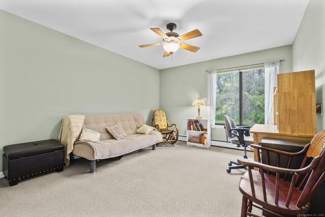 interior space featuring ceiling fan and a baseboard heating unit