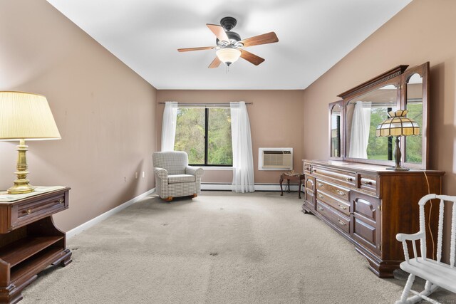 living area featuring baseboards, ceiling fan, baseboard heating, an AC wall unit, and carpet flooring