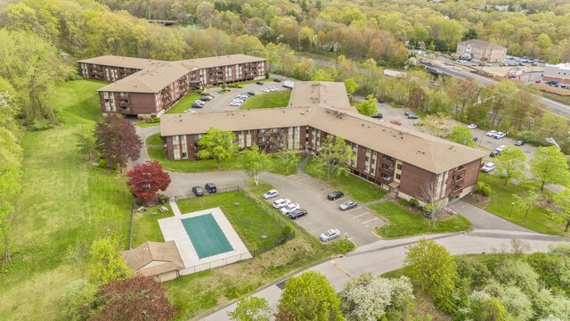 aerial view with a wooded view