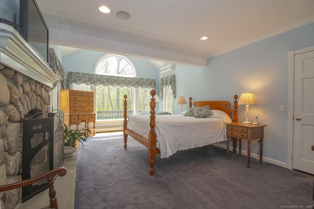carpeted bedroom with a wall unit AC, baseboards, crown molding, vaulted ceiling, and a fireplace