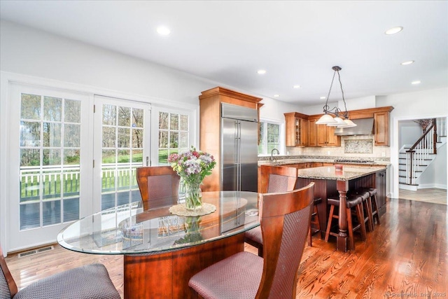 6 E Starrs Plain Rd, Danbury, CT 06810 - dining room featuring recessed lighting, dark wood-style flooring, stairs, and baseboards