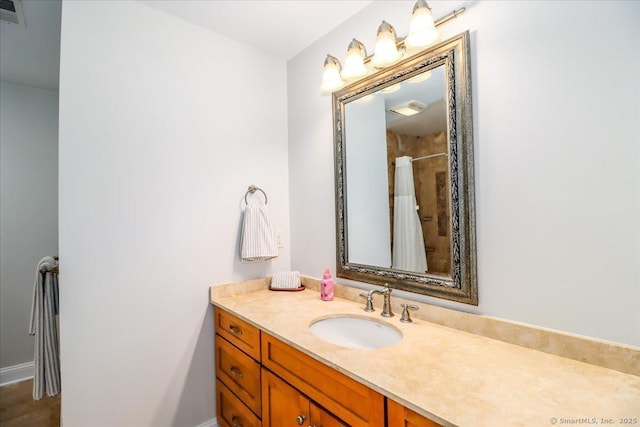 full bathroom with vanity, a shower with curtain, and visible vents