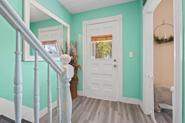 10 Gilmour St, Norwich, CT 06360 - foyer entrance with light wood-style floors and baseboards