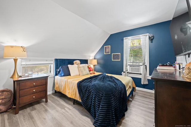 10 Gilmour St, Norwich, CT 06360 - bedroom featuring baseboards, wood finished floors, lofted ceiling, and cooling unit
