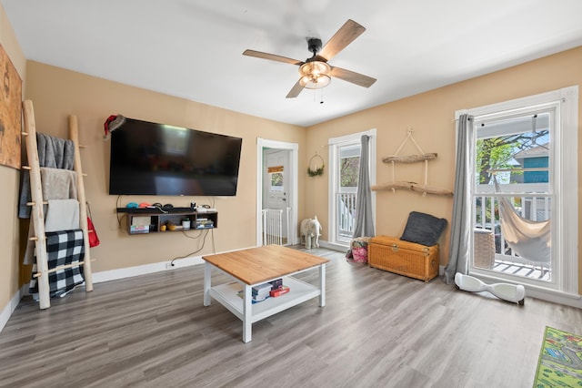 10 Gilmour St, Norwich, CT 06360 - living room featuring a ceiling fan, baseboards, and wood finished floors