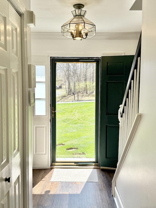33 Steep Hill Rd, Seymour, CT 06483 - entryway featuring crown molding, a chandelier, dark wood-style floors, and stairway