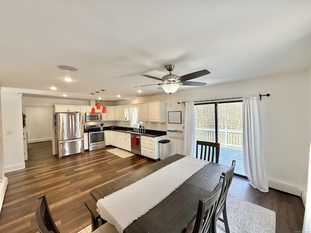 33 Steep Hill Rd, Seymour, CT 06483 - kitchen featuring appliances with stainless steel finishes, dark countertops, recessed lighting, baseboards, and ceiling fan