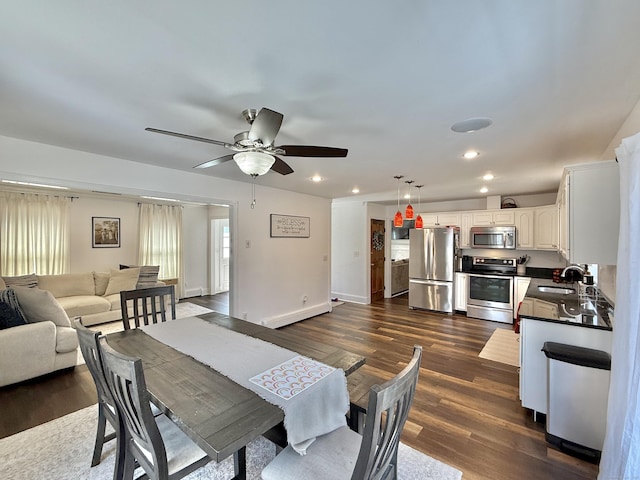 33 Steep Hill Rd, Seymour, CT 06483 - dining area featuring dark wood-style flooring, ceiling fan, recessed lighting, and baseboards