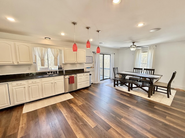 33 Steep Hill Rd, Seymour, CT 06483 - kitchen with dishwasher, a sink, dark countertops, recessed lighting, and hanging light fixtures