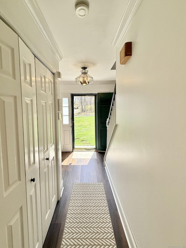 33 Steep Hill Rd, Seymour, CT 06483 - corridor featuring ornamental molding, dark wood finished floors, and stairs