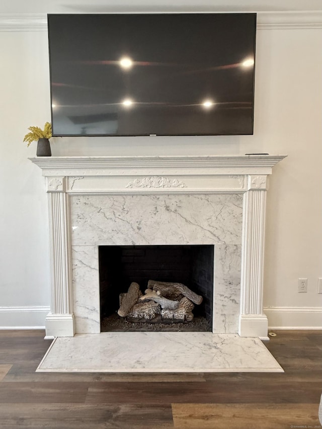 33 Steep Hill Rd, Seymour, CT 06483 - detailed view of a premium fireplace, baseboards, wood finished floors, and crown molding
