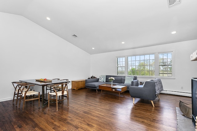 living area with vaulted ceiling, wood finished floors, and visible vents