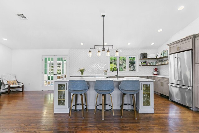 95 Brighton View Rd, Fairfield, CT 06824 - kitchen featuring high quality fridge, light countertops, decorative backsplash, french doors, and open shelves