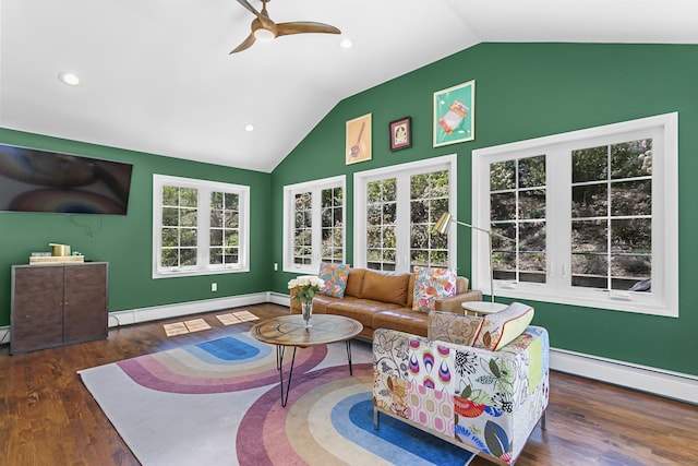 living area with wood finished floors, a ceiling fan, lofted ceiling, and baseboard heating