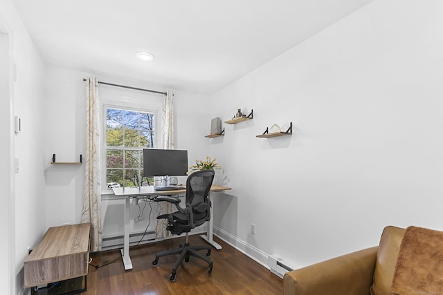 office space with baseboards, recessed lighting, wood finished floors, and baseboard heating