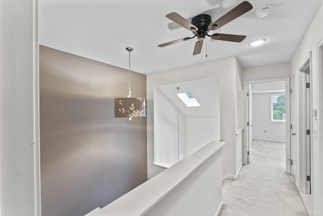 12 Boulevard Dr Unit 21-130, Danbury, CT 06810 - hallway with light colored carpet and a skylight
