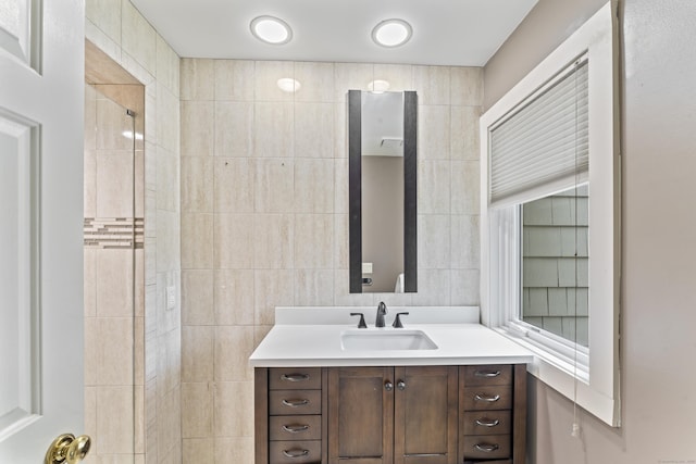 12 Boulevard Dr Unit 21-130, Danbury, CT 06810 - full bath with vanity, a tile shower, and tile walls