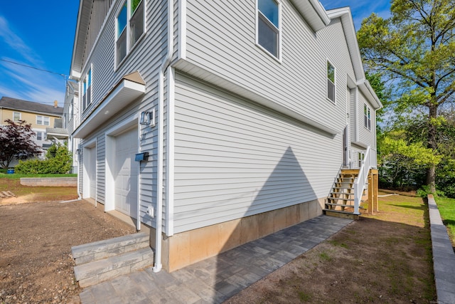 29 Sterling St, New Britain, CT 06053 - view of side of home with stairway