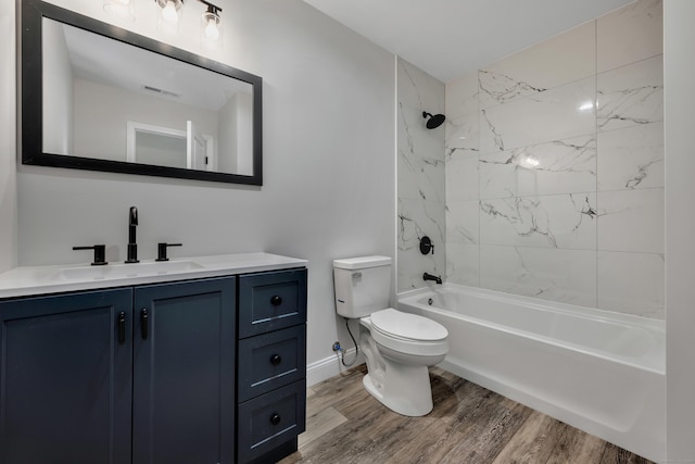 29 Sterling St, New Britain, CT 06053 - full bath featuring vanity, toilet, wood finished floors, bathing tub / shower combination, and baseboards