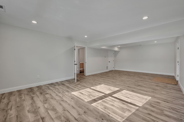 29 Sterling St, New Britain, CT 06053 - finished basement featuring recessed lighting, light wood-style floors, and baseboards