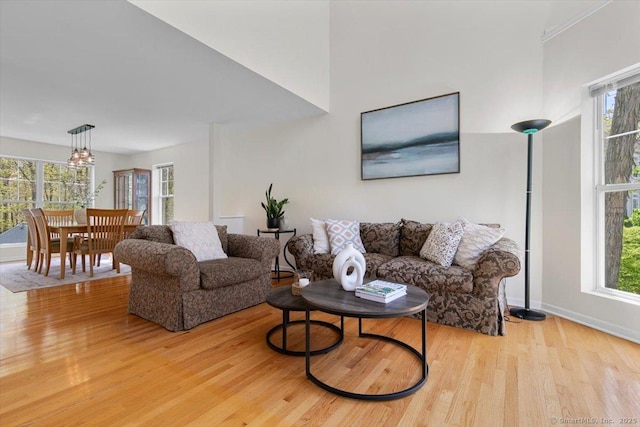 5 Pheasant Run, Guilford, CT 06437 - living room with light wood-type flooring and baseboards