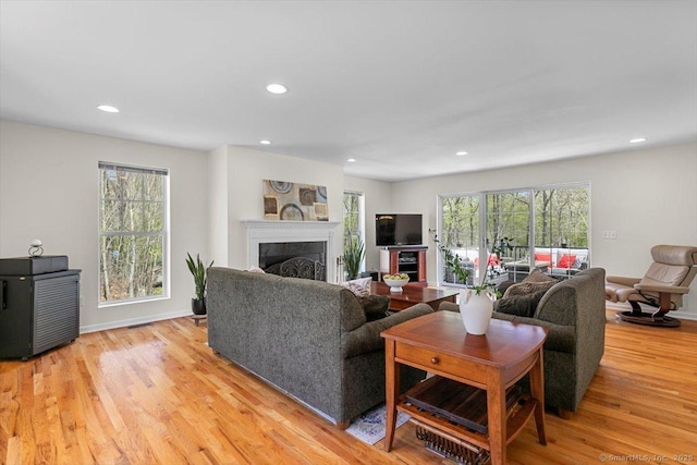 5 Pheasant Run, Guilford, CT 06437 - living area with light wood-style flooring, a fireplace, and recessed lighting